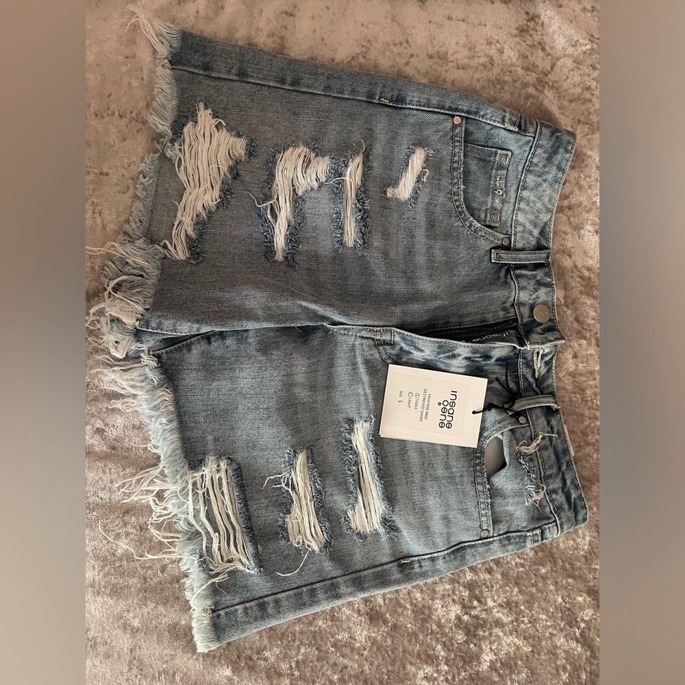 Distressed denim shorts